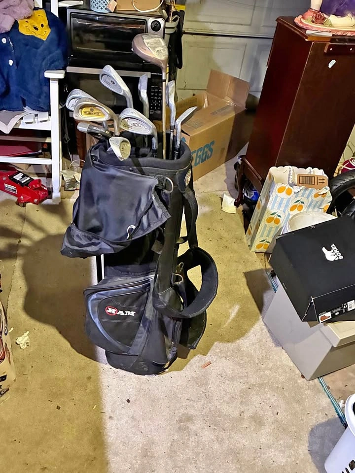 Ram Standing golf bag with various golf clubs