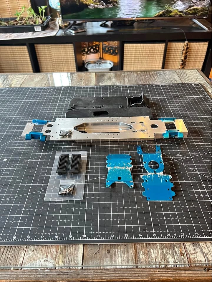 Team Associated MGT 4.6 Chassis & F/R Skid Plate Parts Lot