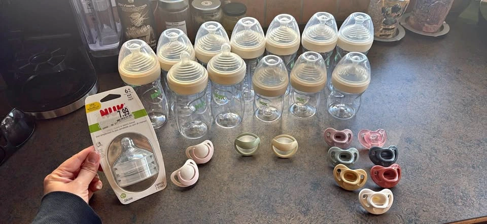 Complete set of NUK bottles and pacifiers