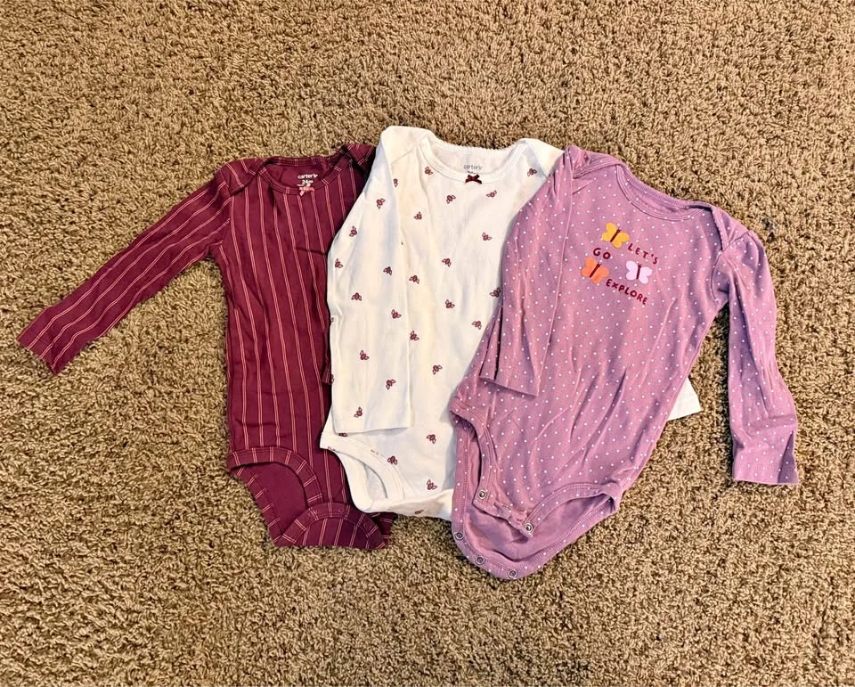Three Carters girls onesies