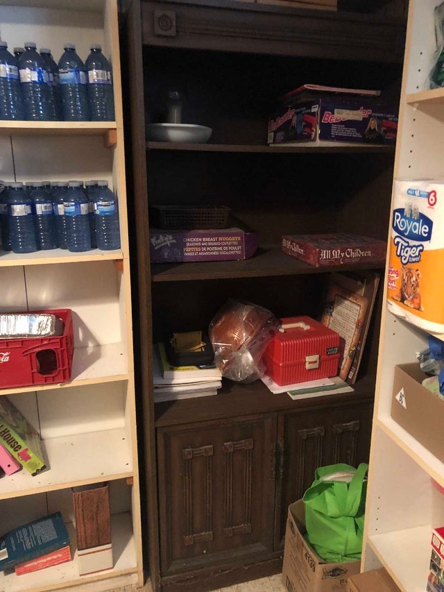Brown wooden bookshelf with bottom cabinet