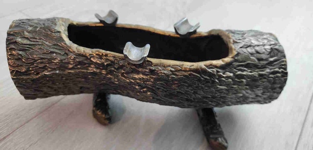 Vintage brass log-shaped ashtray with textured bark finish