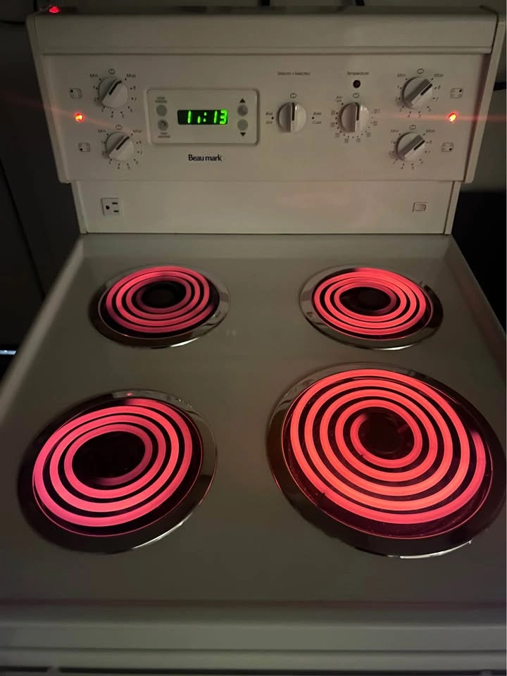 Apartment Size 24” Electric Coil Stove - photo 2