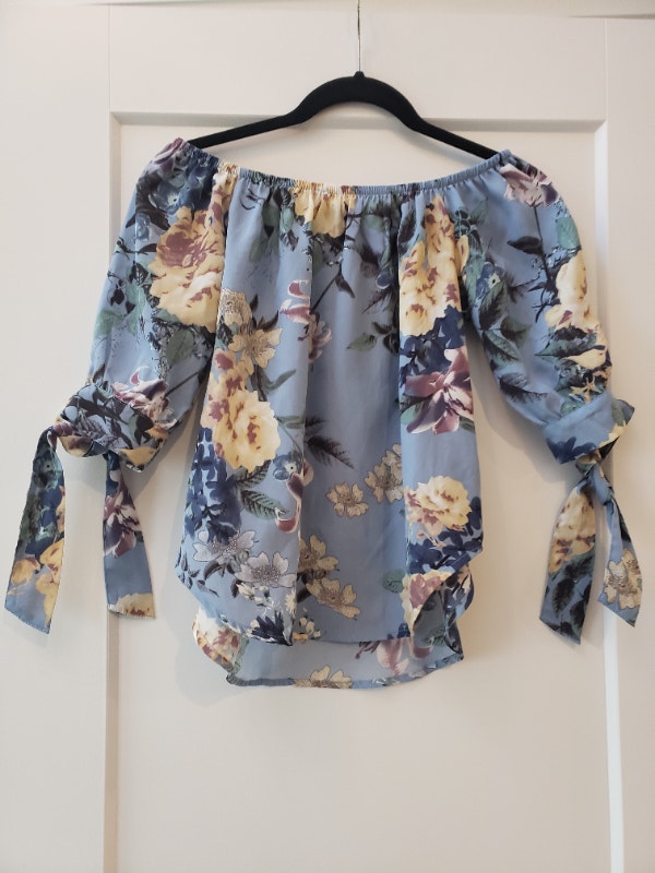 Bundle of two women's size small floral tops