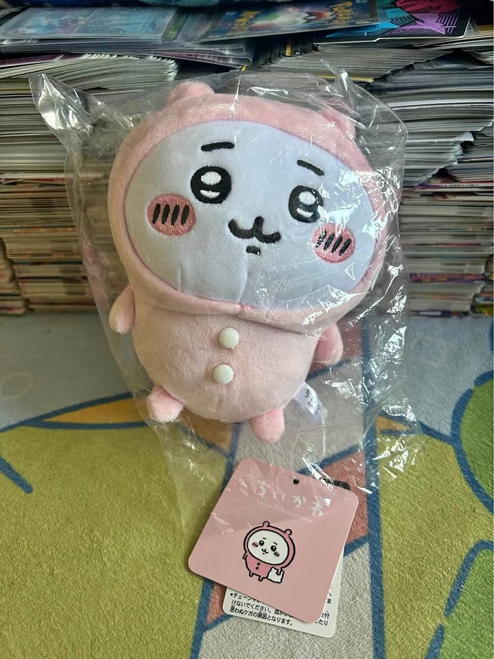 Chiikawa in pink onesie plush toy