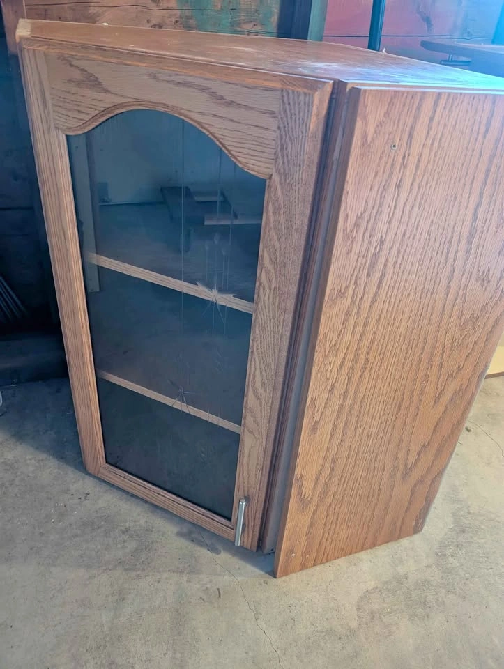 Upper corner oak cabinet