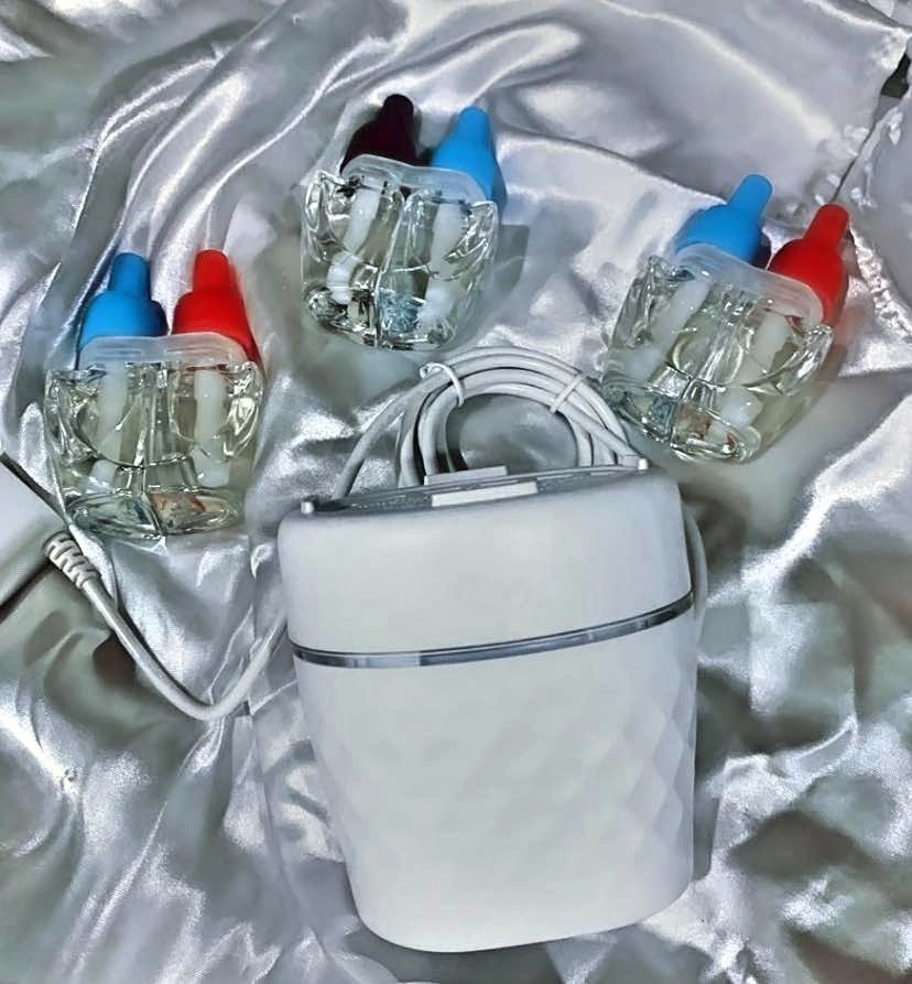 Febreze Wallflowers Scent Switcher Plug-In with 3 Refills