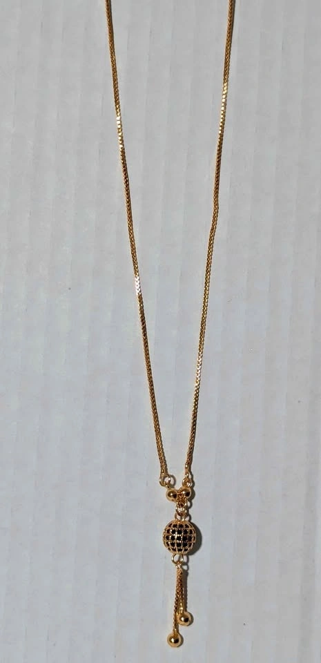 Gold-Toned Sphere Pendant Necklace with Tassel
