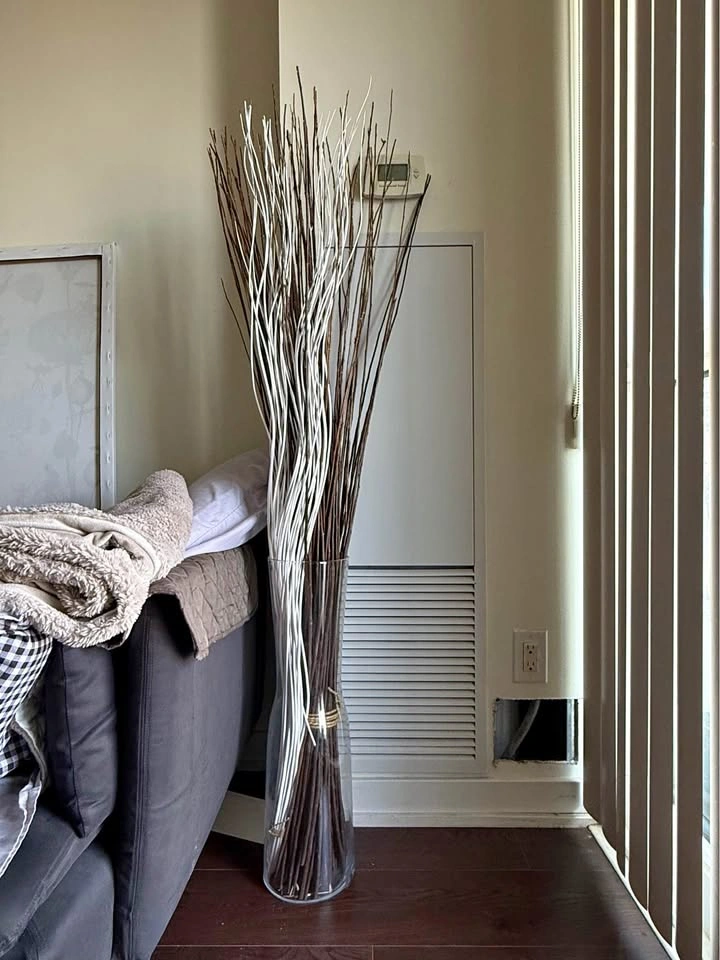 Tall vase with dried bouquet