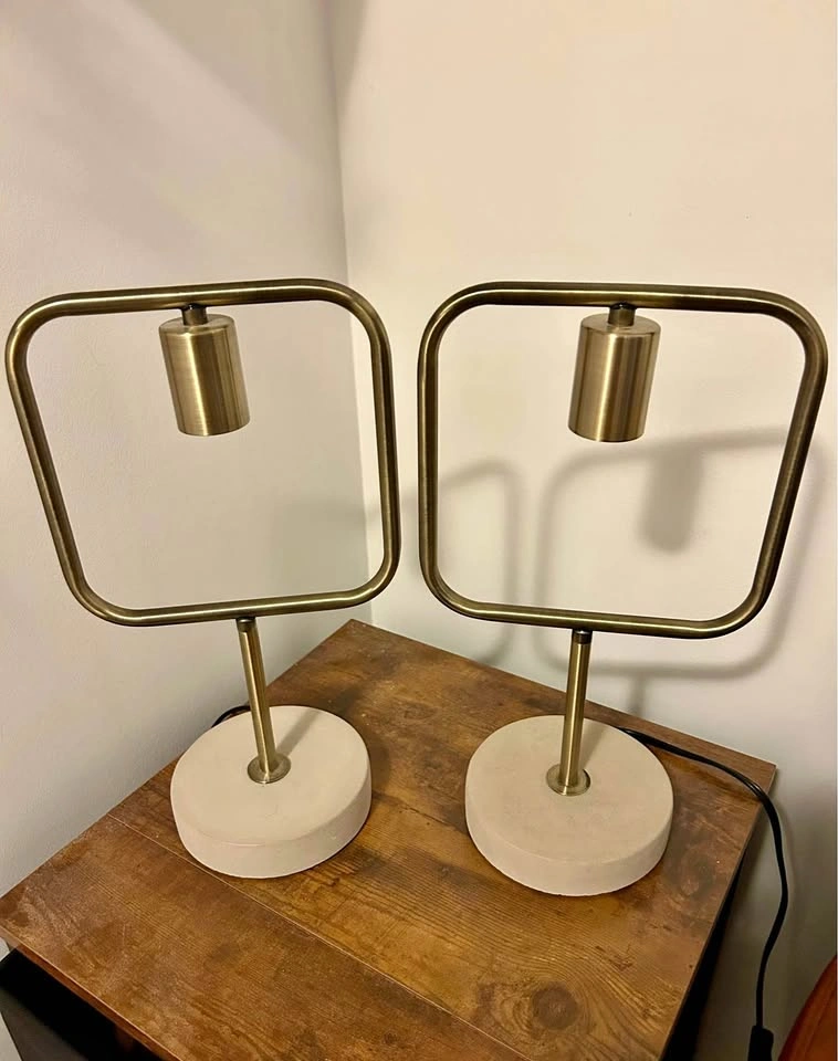 Two Matching geometric table lamps with brushed gold frames