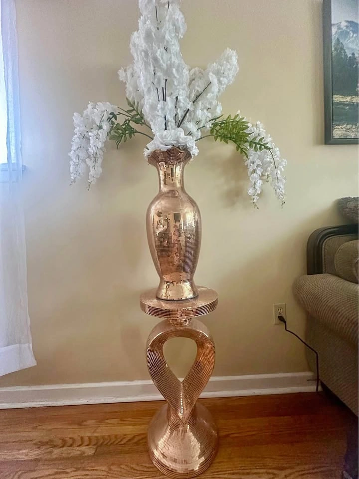 Tall rose gold mosaic vase and stand with flowers