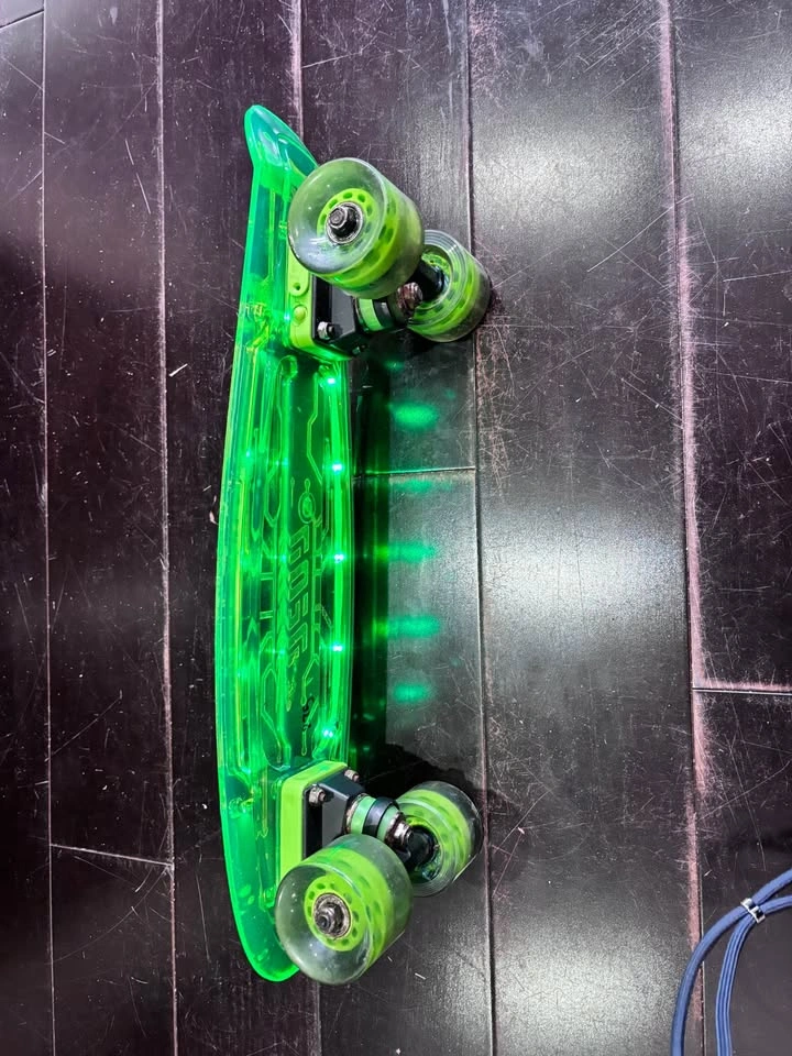Yvolution Neon Hype green skateboard featuring light-up deck - photo 3