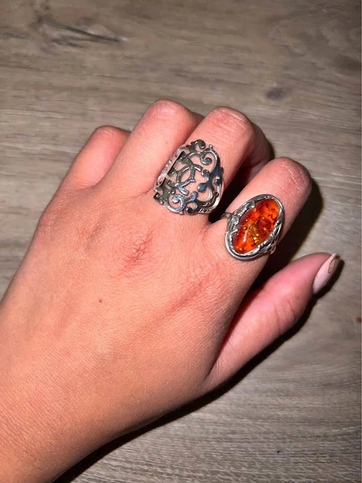 Silver ring set with amber