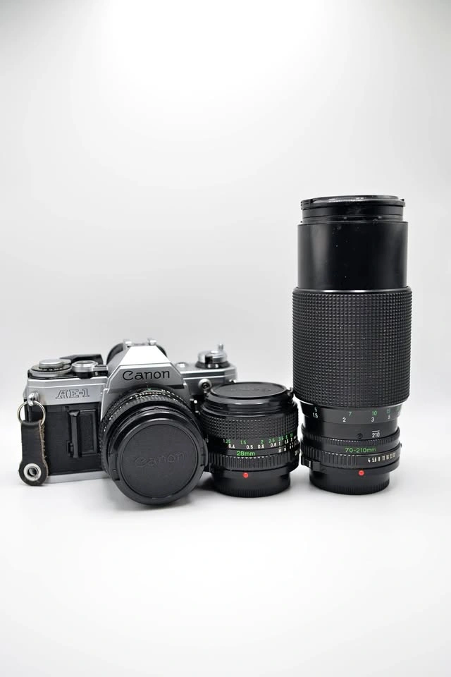 Canon AE-1 35mm Film SLR Bundle with 3 Lenses & Flash