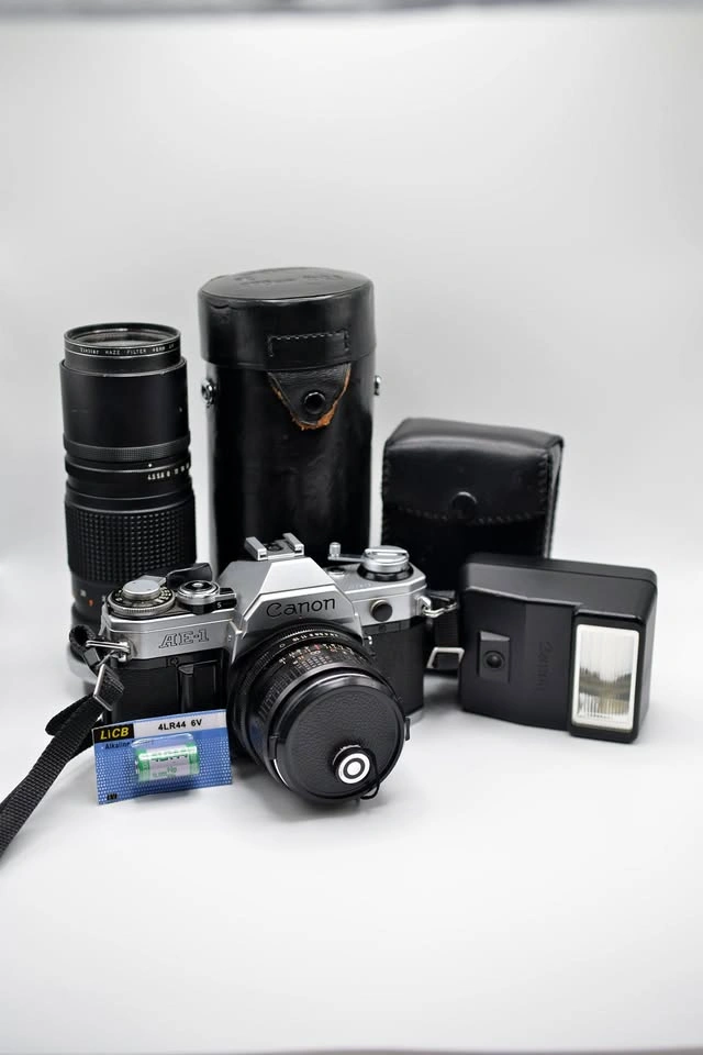 Canon AE-1 35mm Film Camera Kit with Lenses and Flash