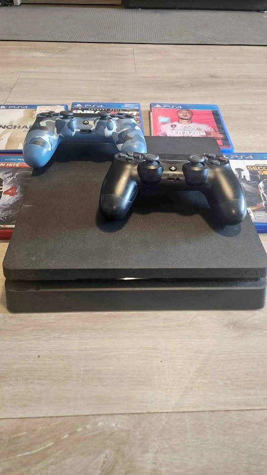 PS4 1 TB with 2 controllers and games