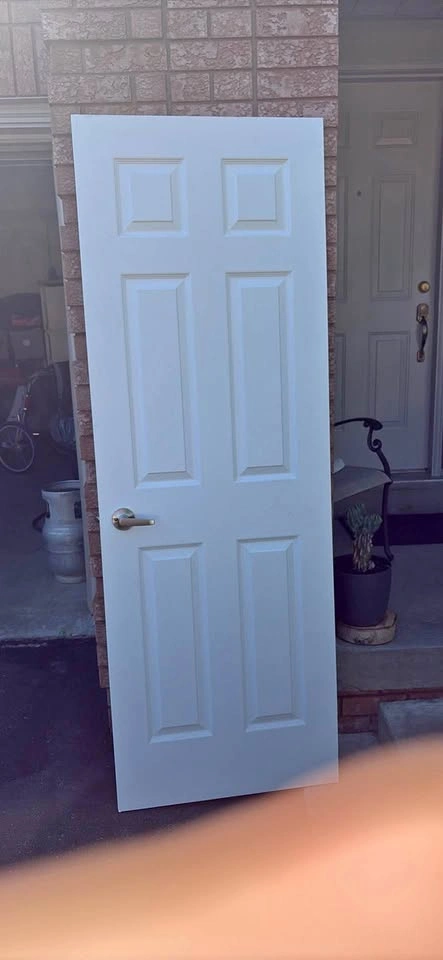 Alexandria Moulding 6-panel textured interior door