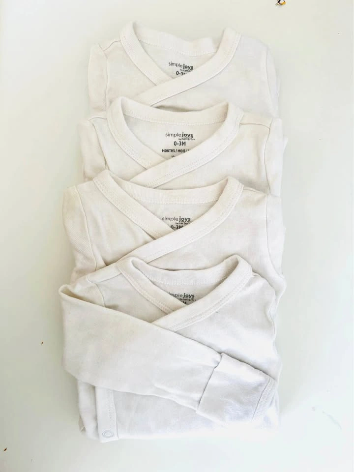 Bodysuit sets (0-3 months). 3 sets.