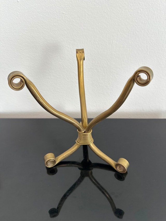 Vintage brass scrollwork three-legged stand