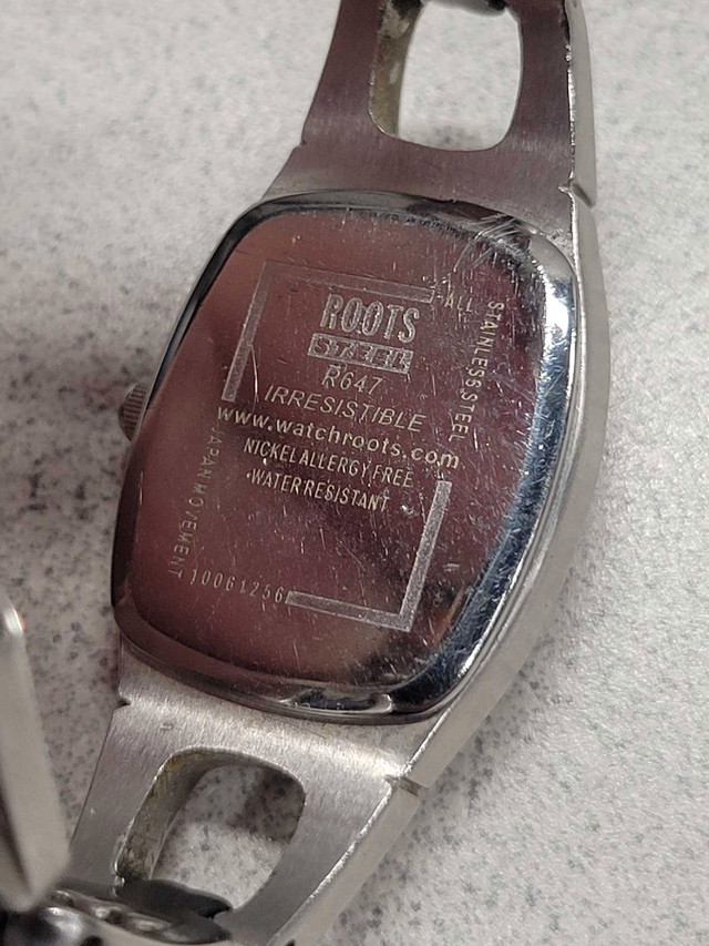 Ladies Irrestible ROOTS watch, silver and pink dial. - photo 5