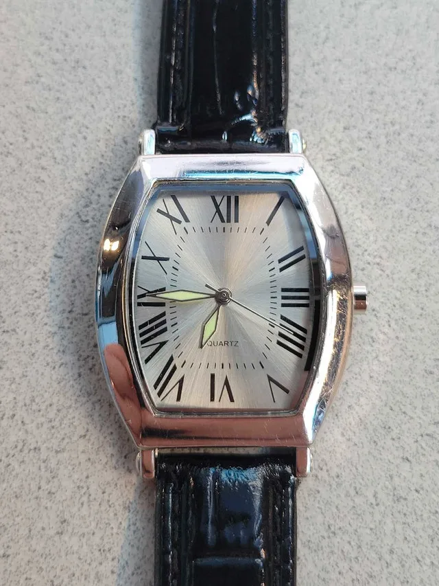 Silver dress watch in amazing condition. New battery thumbnail