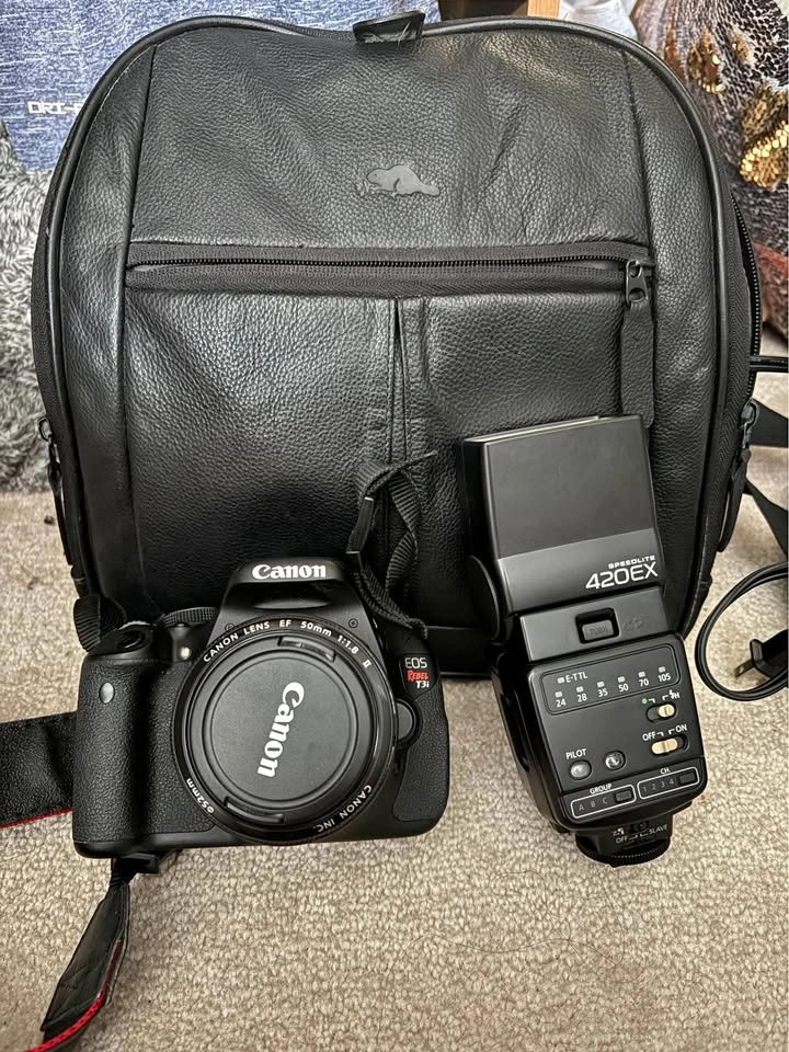Canon EOS Rebel T3i with 50mm f/1.8 II Lens and Speedlite 420EX