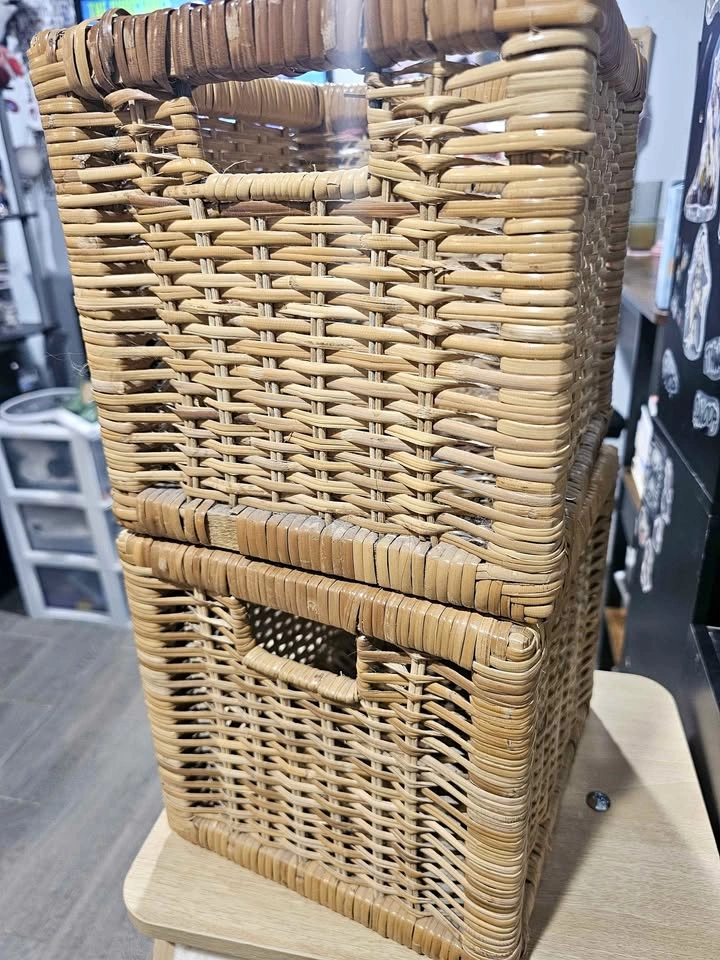 Two hand-woven storage baskets