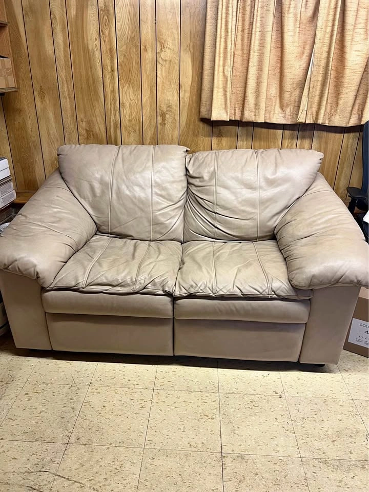 beige leather reclining sofa
