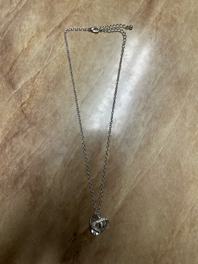 Necklace with interlocking heart pendant. Silver colour - photo 2