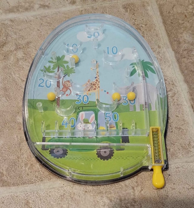 Handheld pinball game