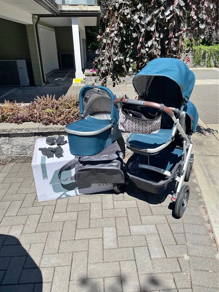 UPPAbaby Vista V2 Double Stroller with Bassinet and toddler seat