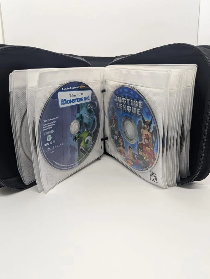 Disney/Pixar & Family Movie DVD Binder Lot (25+ Discs) - photo 2