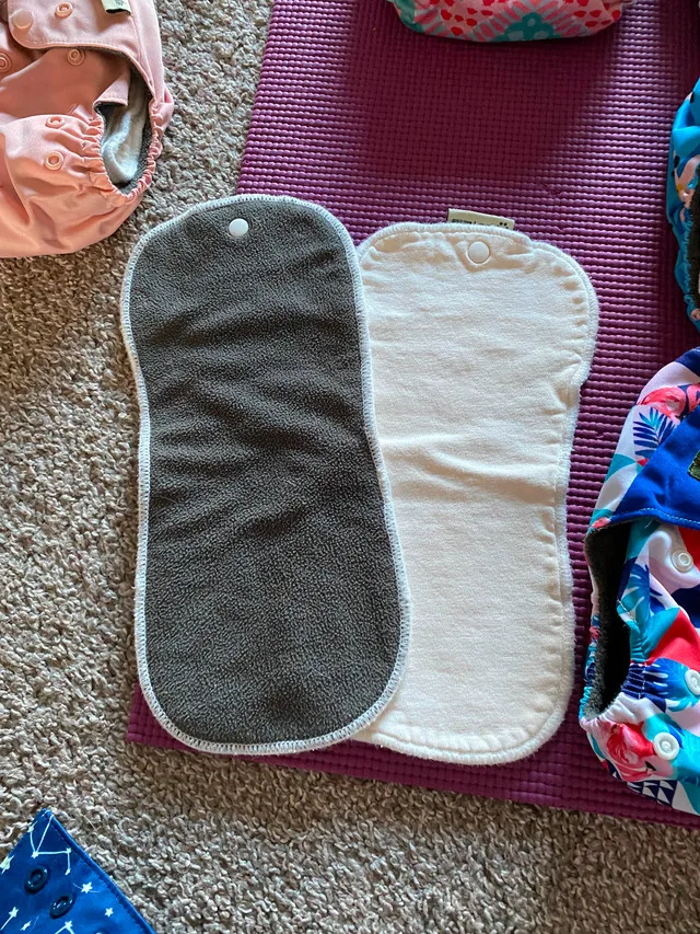 24 All-In-One Cloth Diapers + 2 Diaper Genies image indicator(2)