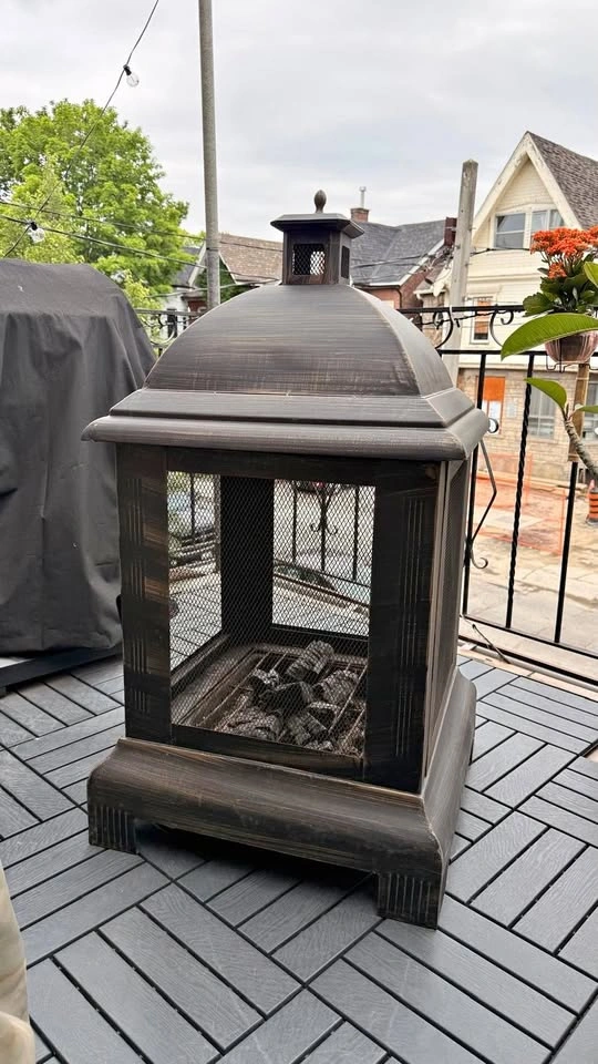 Like New - Steel Outdoor Fireplace + Protective Cover