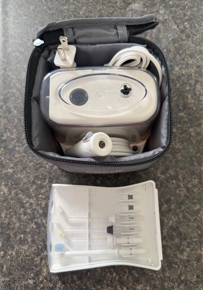 Travel size waterpik and travel case - photo 2