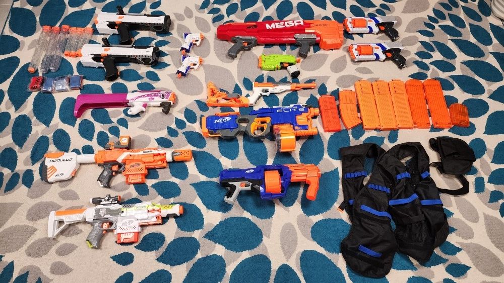 Assorted Nerf Guns And Accessories