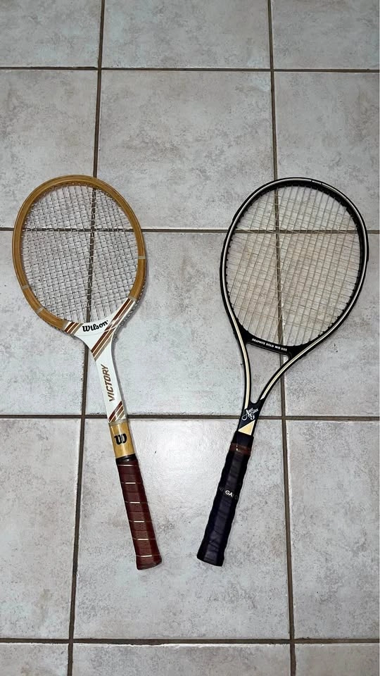 2 Tennis Rackets with a box of few Tennis balls