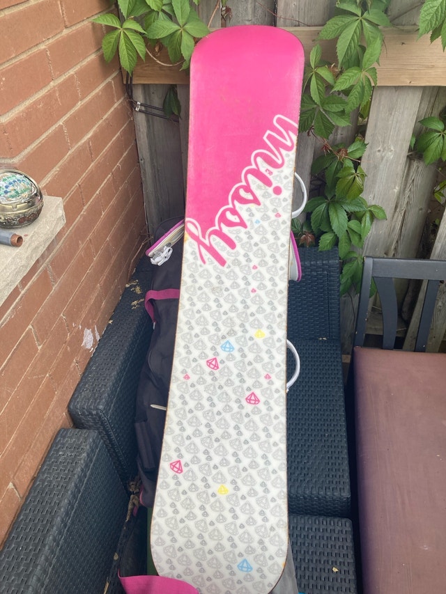 Snowboard with bindings and bag