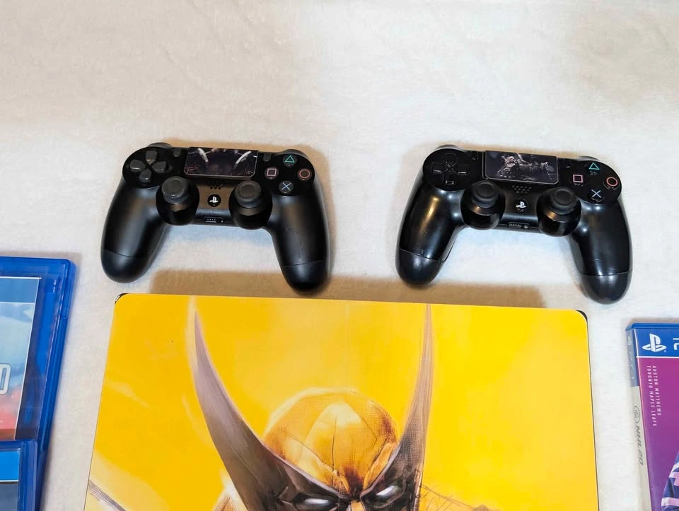 Ps4 Pro 1TB With Wolverine Skin ( 2 Controllers and 5 Games) - photo 3