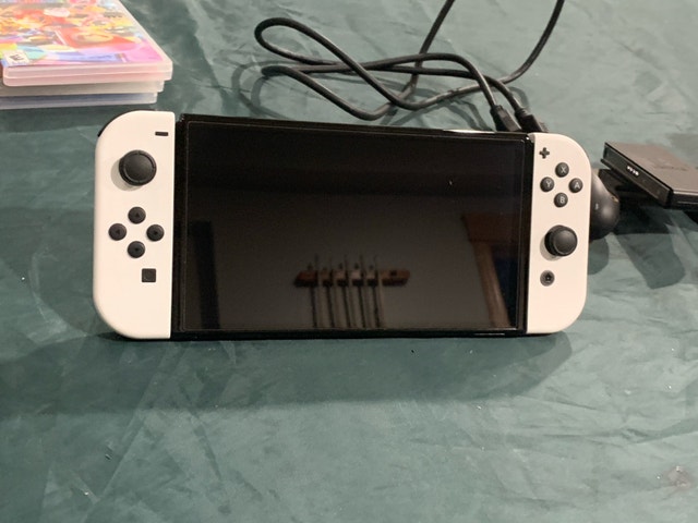 Nintendo switch OLED white. Includes 4 games - photo 3