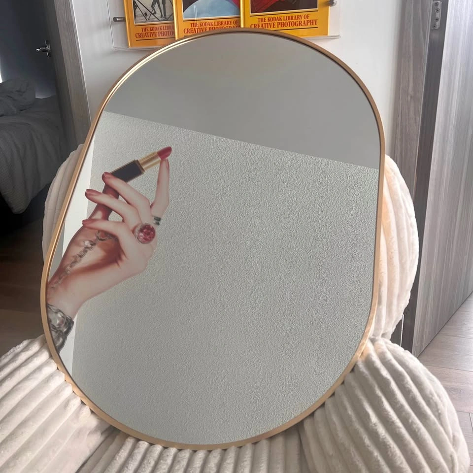 Mirror with Lipstick Motif and Gold Trim