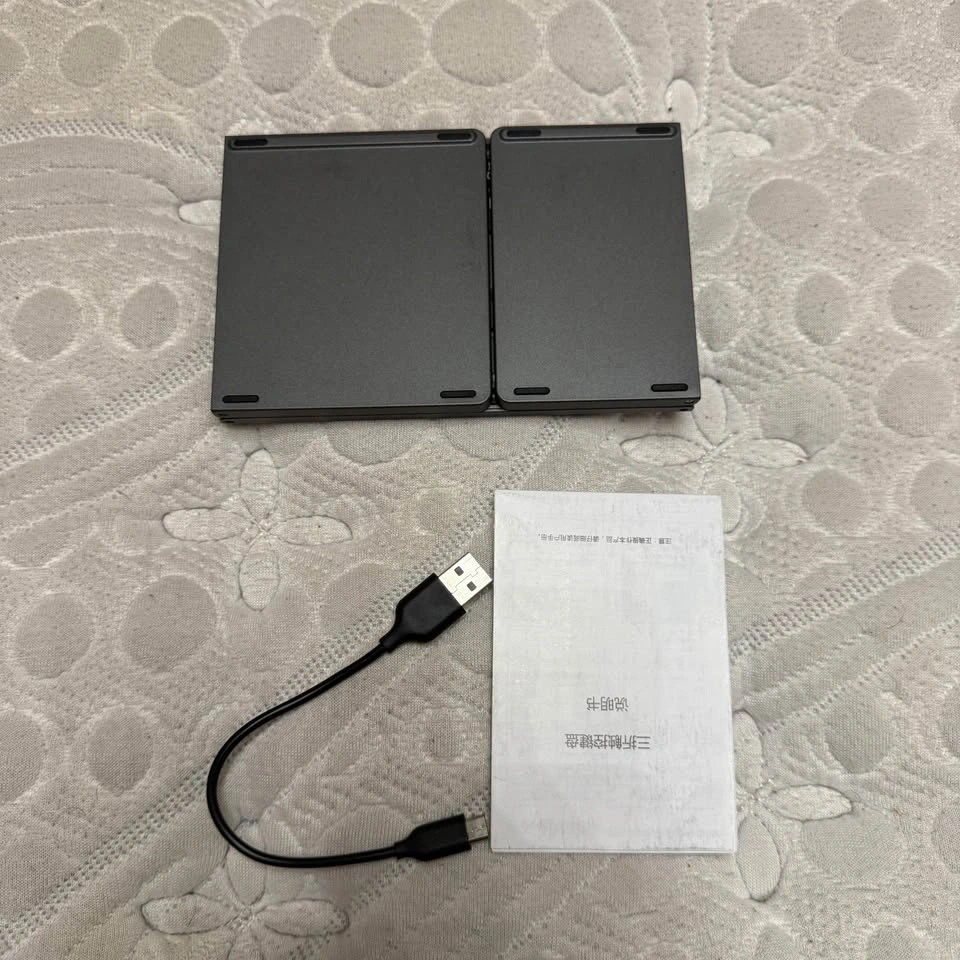 Foldable Rechargeable Bluetooth Keyboard & Touch Pad - photo 2