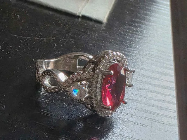 vintage-style sterling silver ring with a large, oval-red stone thumbnail