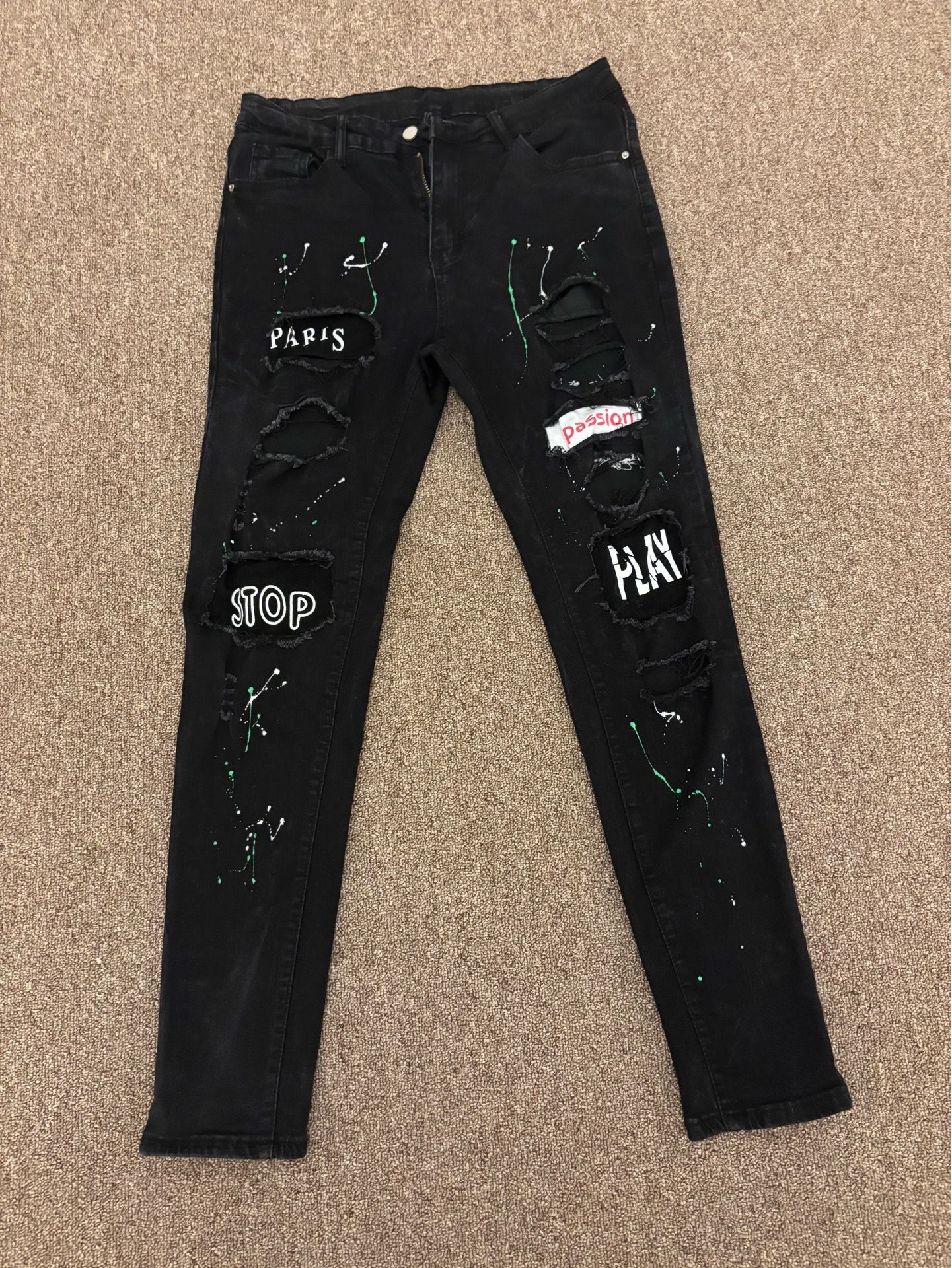 Ripped Paris jeans with designs size 32