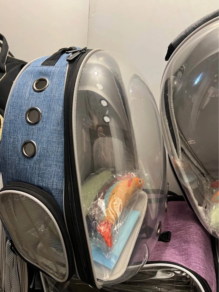 Pet carrier backpack, cat toy, and pet training pad - photo 2