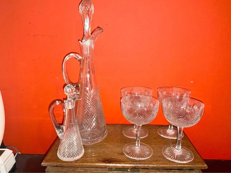 Antique glass wine decanter, cruet, and 4 stemmed glasses