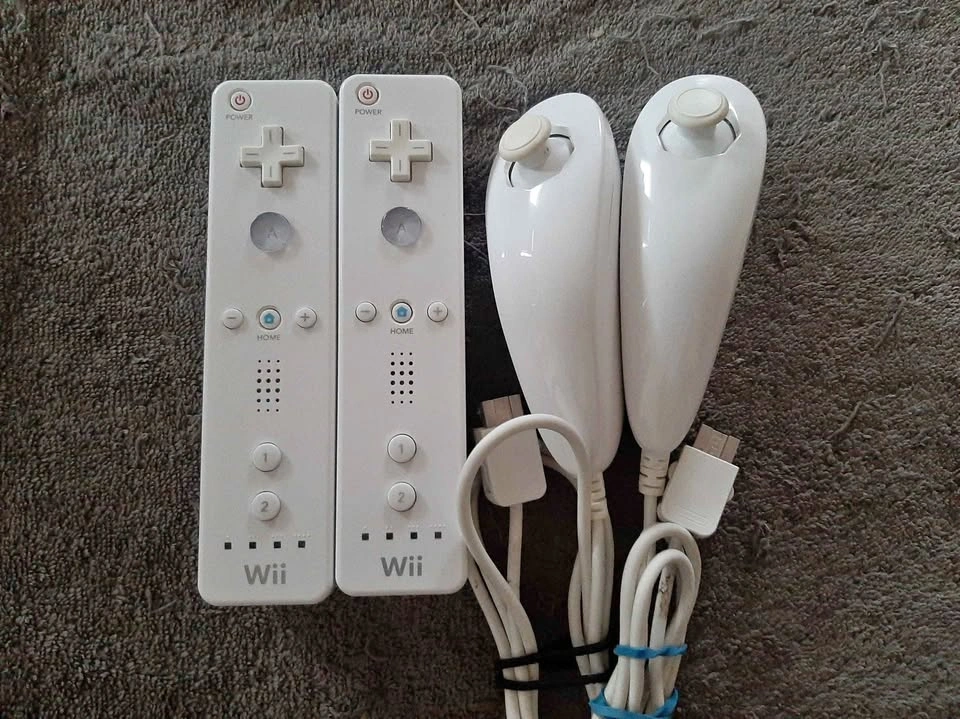 Nintendo Wii Remote Controllers and Nunchucks