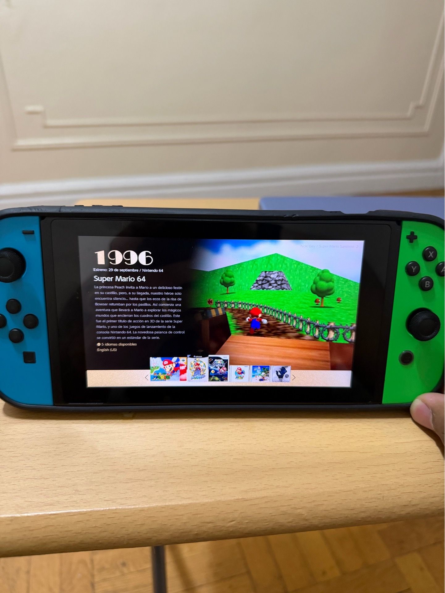 Nintendo Switch in good condition, fully functional, with 8 game