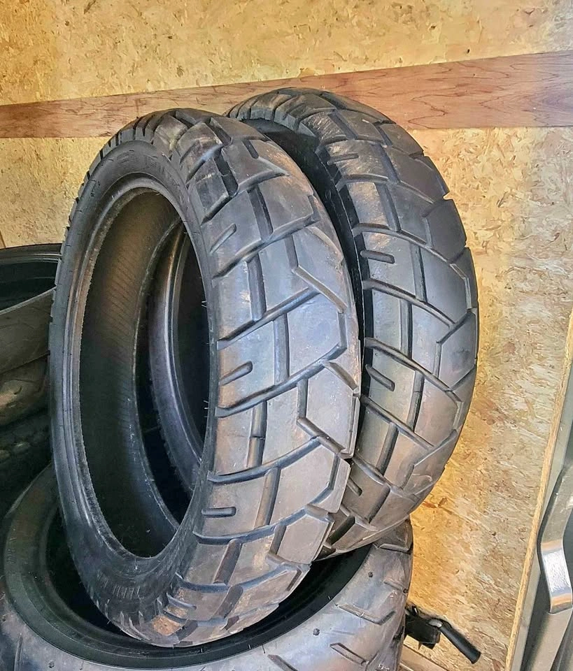 Two Shinko MasterTrail motorcycle tires