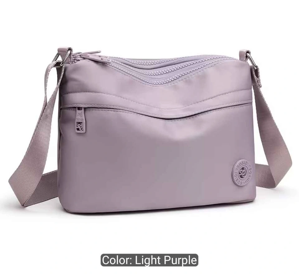 Brand new premium nylon multi pocket light weight crossbody bag - photo 2